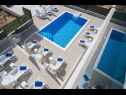Apartamenty Ivan - with heated pool and seaview: A1(4), B1(4) Postira - Wyspa Brac  - basen