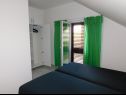 Apartamenty Coloured - apartments on island: A1 - plavi (4):, A2 -zeleni (4):, SA3 - studio (2+1):, A4 - bijeli (4+2): Povlja - Wyspa Brac  - Apartament - A4 - bijeli (4+2):: sypialnia