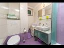 Apartamenty Palmina - comfort apartment: A1 veliki (6),  A2 žuti (4+1), A3 lila (2), SA4 bijeli (2) Makarska - Riwiera Makarska  - Apartament -  A2 žuti (4+1): łazienka z WC