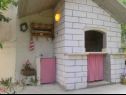 Apartamenty Viki - seaview & garden terrace: A1(6) Makarska - Riwiera Makarska  - komin