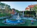 Apartamenty Mig - with beautiful garden: A1(2+1), A3(4+1), A4(4+1) Supetarska Draga - Wyspa Rab  - dziedziniec