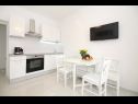 Apartamenty Anamarija - garden terrace : A1(4) Split - Riwiera Split  - Apartament - A1(4): kuchnia z jadalnią
